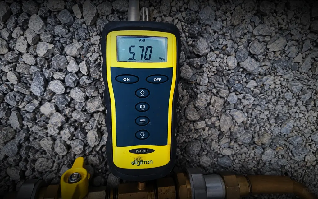 Certified Hamilton gasfitter connecting a gas appliance line